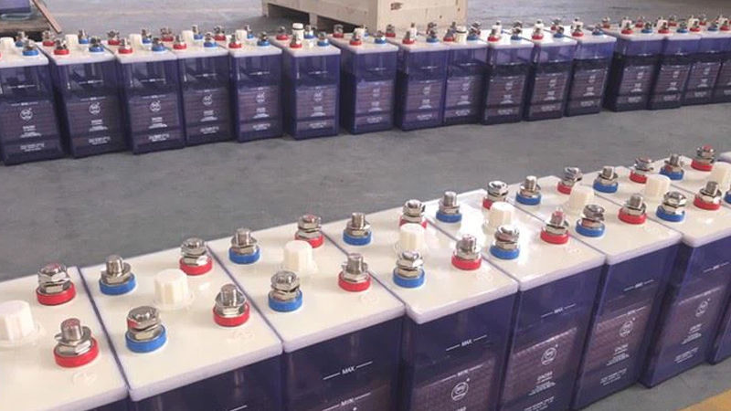 Industrial nickel cadmium (NiCad) battery bank installed on steel racks in a Middle East substation DC room, providing long‑duration backup for protection, control and SCADA systems