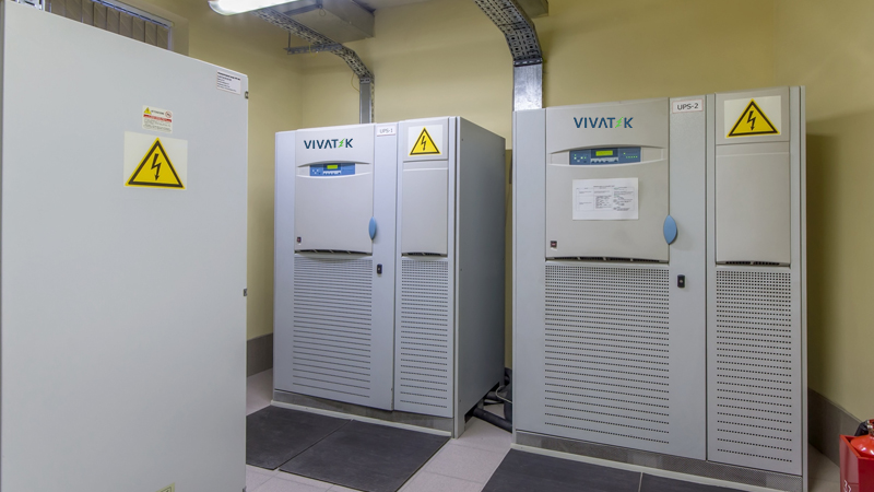 Industrial online UPS system supplying uninterrupted power to critical industrial loads in a manufacturing plant