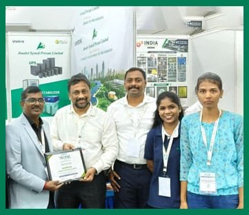 Anushri Systech exhibition team with customers