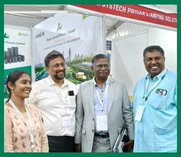Visitors interacting with the Anushri Systech team at an exhibition